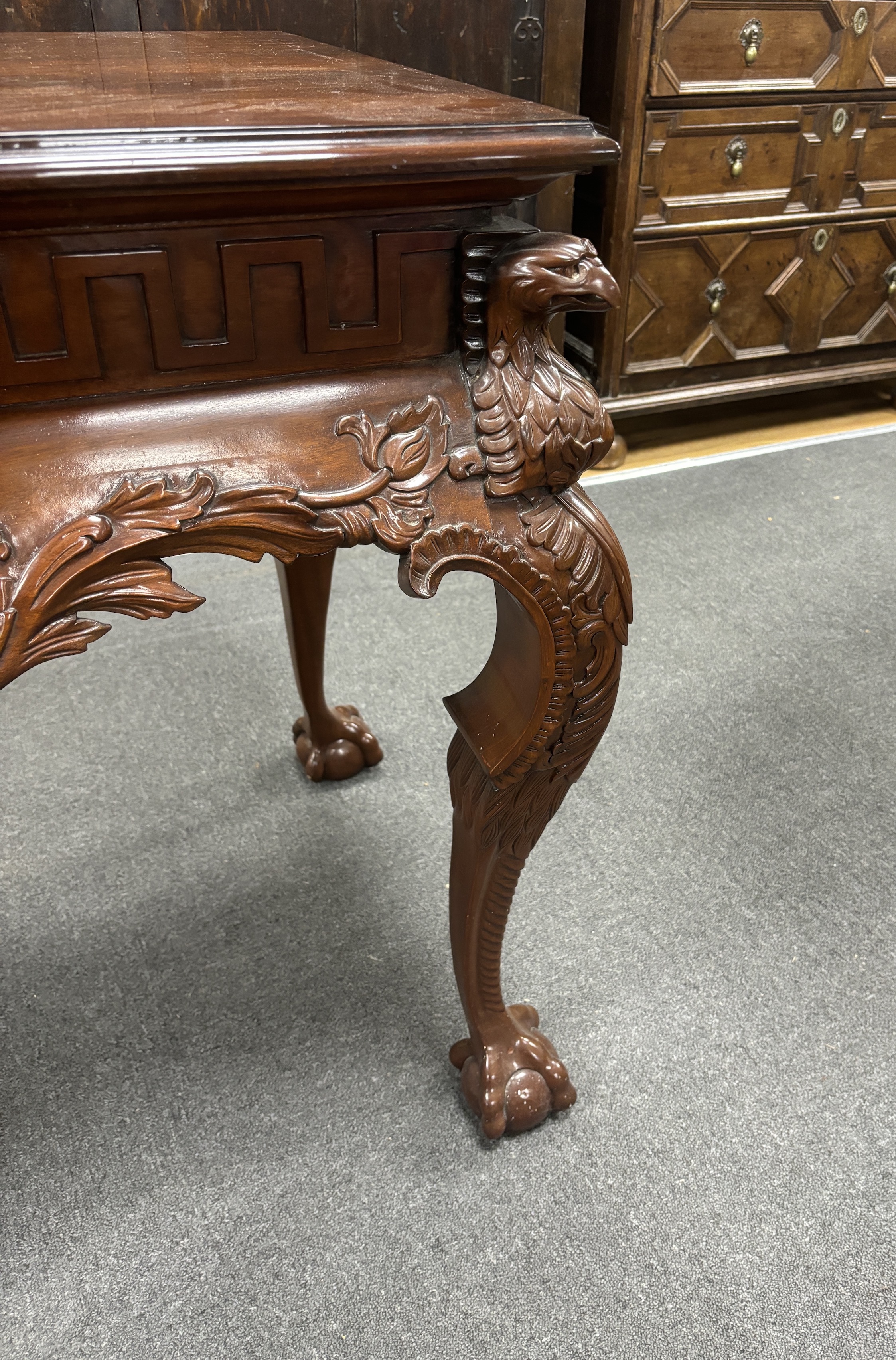 An 18th century style carved mahogany console table, width 136cm, depth 63cm, height 84cm